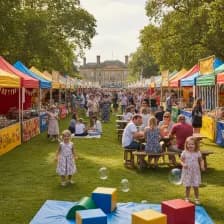 Families enjoying street food and music at Himley Hall, Dudley.