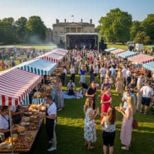 Festival-goers enjoying food and music at Himley Hall