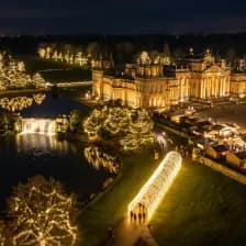 Blenheim Palace illuminated trail with lights reflecting on water