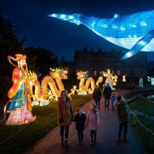 Giant illuminated lanterns of a blue whale and dragons at Longleat